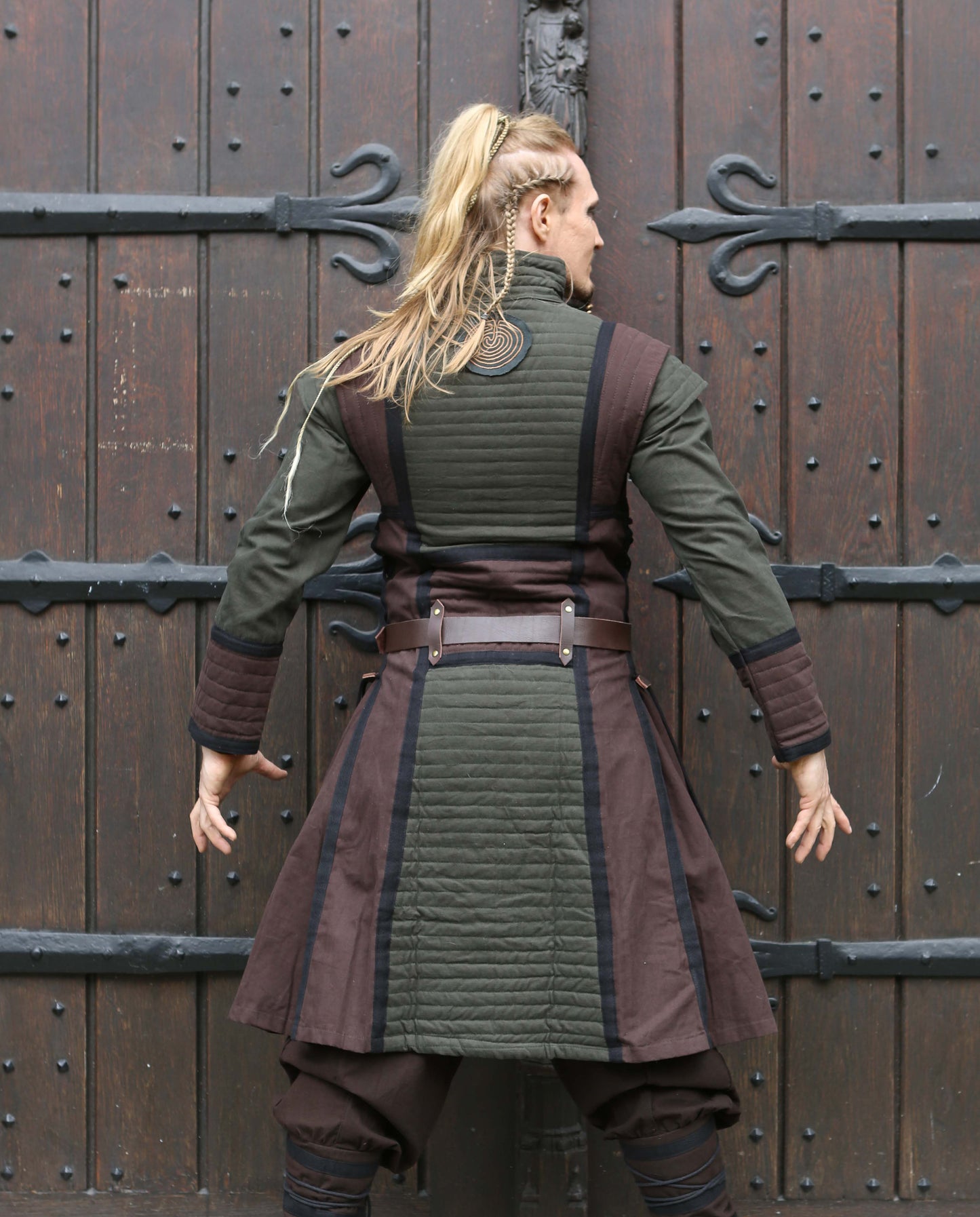 manteau genou homme guerrier